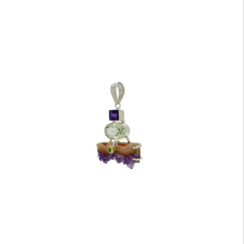 Multicolored gemstone pendant on a white background