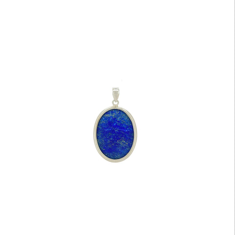 Silver pendant with a blue lapis lazuli stone on a white background
